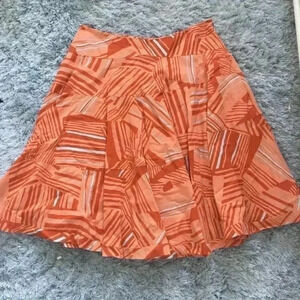 Anthropologie orange‎ patterned midi skirt